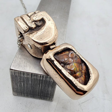 Raised Fist Fire Agate Pendant